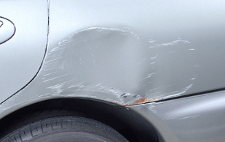 Example of dents with scratches on a used car.